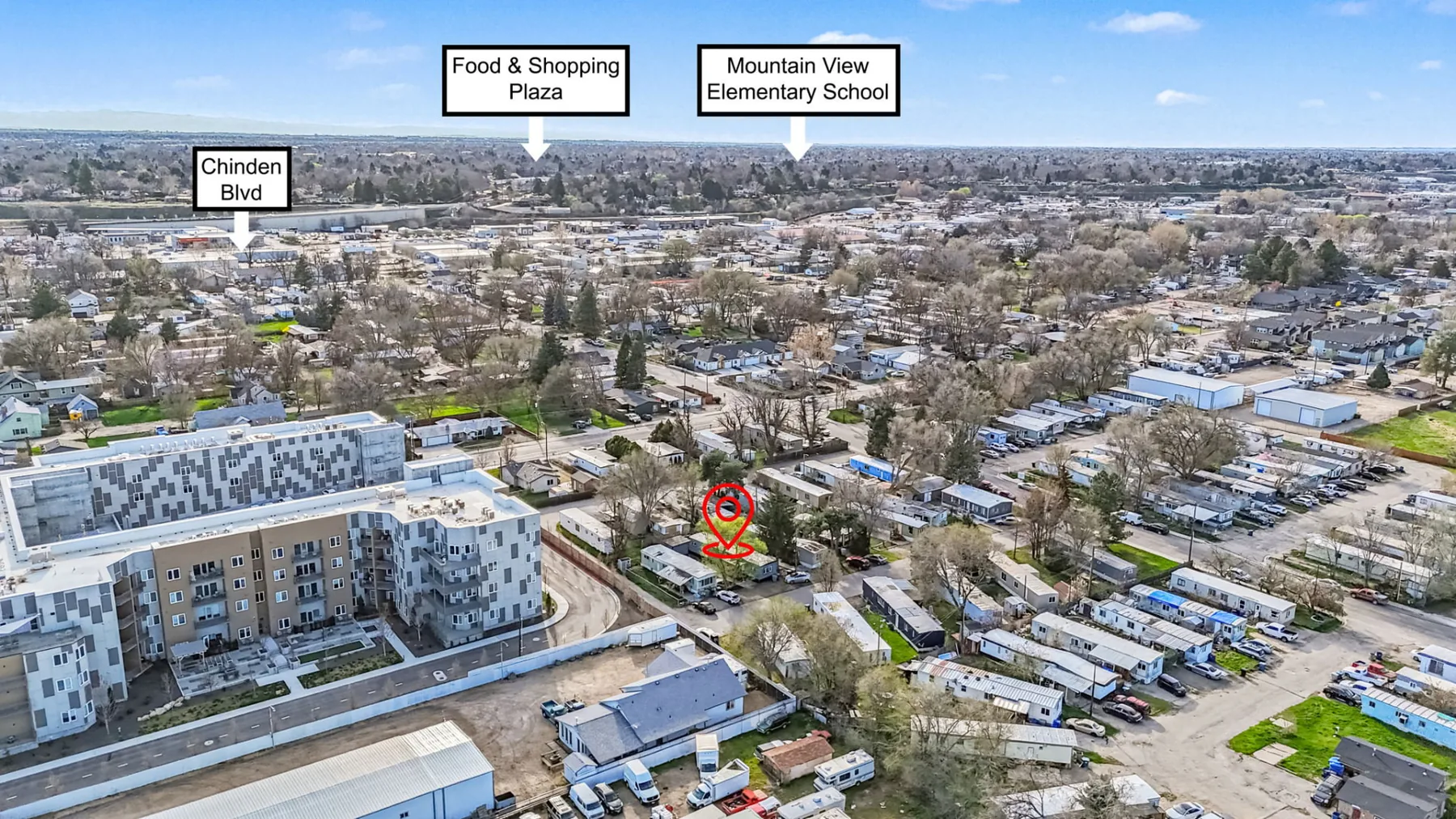 Aerial view of the Garden City neighborhood with a marker showing the location of the home