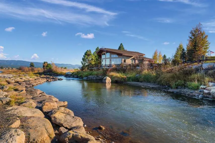 Home overlooking a rocky river bend in Idaho
